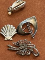 4 Silver brooches