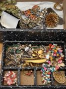 Unsorted box of costume jewellery to include watch