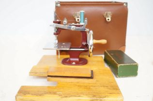 Small cased childs vintage sewing machine