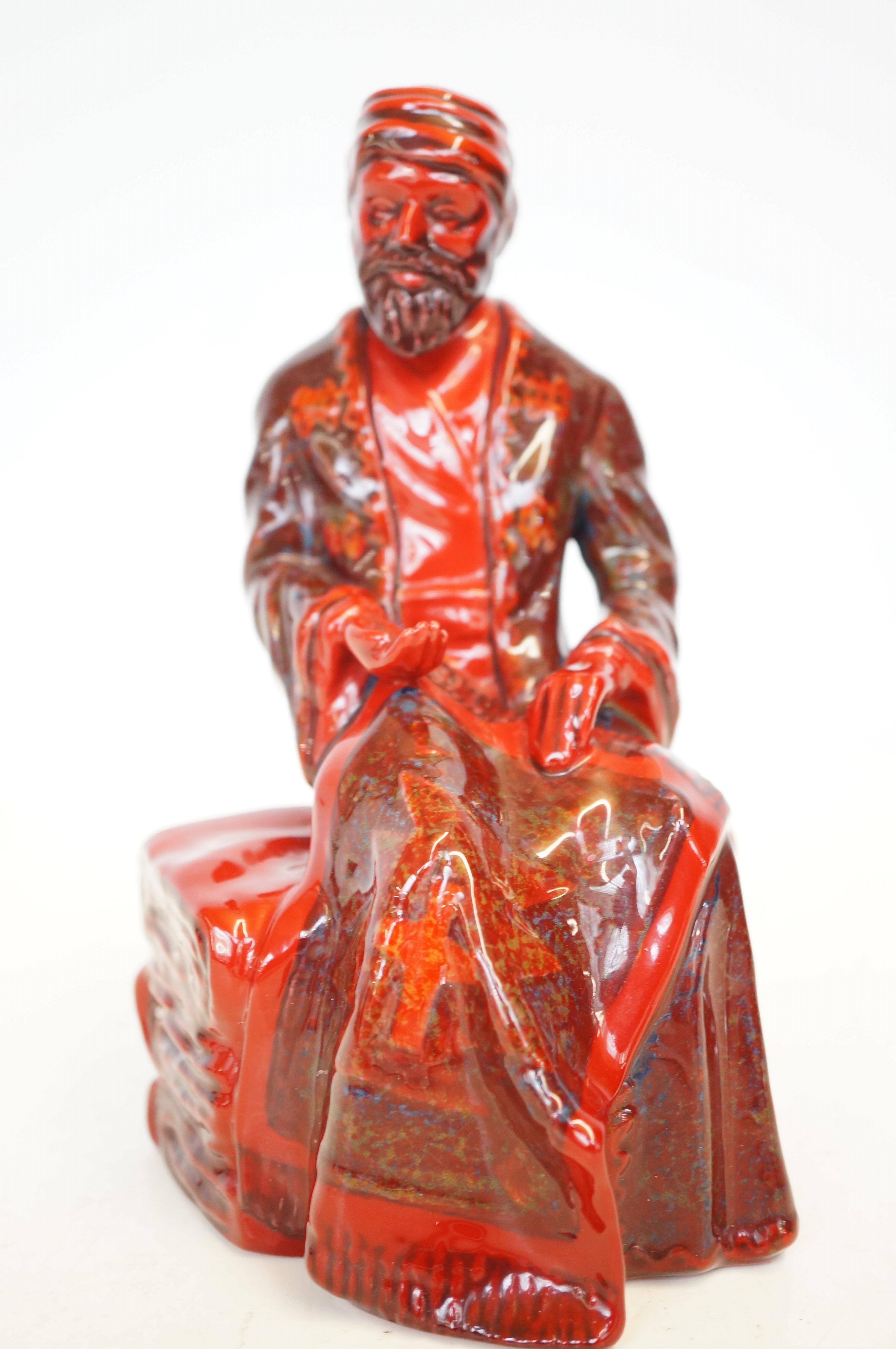 Royal Doulton flambe figure The carpet seller HN32