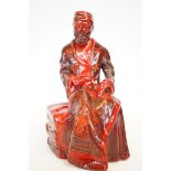 Royal Doulton flambe figure The carpet seller HN32