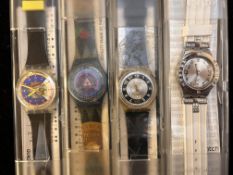 4x Boxed Swatch watches