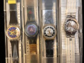 4x Boxed Swatch watches