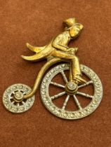 Penny farthing brooch