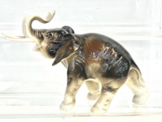 Royal Dux elephant, minor chip to end of tusk. pin