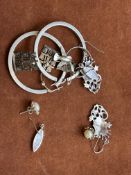 6 Pair of silver earrings