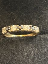 9ct Gold ring set wth 3 sapphire & 4 cz stones Siz