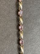 9ct Gold bracelet set with diamonds & purple stone