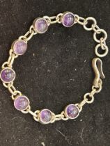 Silver bracelet set with 7 amethyst