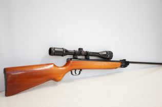 Mid century air rifle with apollo scope