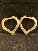 Pair of 9ct gold heart shaped earrings Weight 2.9g