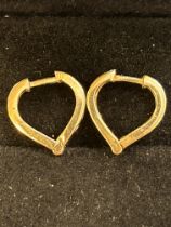 Pair of 9ct gold heart shaped earrings Weight 2.9g