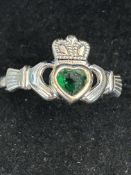 9ct White gold claddagh ring set with green stones