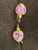 Pair of 9ct gold earrings set with amethyst Weigh