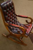 Leather buttoned rocking chair in ox blood
