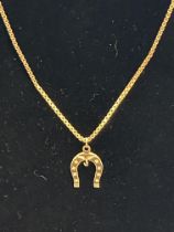 9ct Gold chain with horse shoe pendant Weight 6.5g