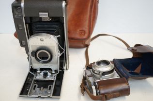 Polaroid model 150 vintage camera together with a