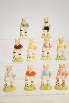 10 boxed Beswick football cats - various colours