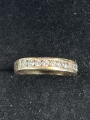 9ct Gold ring set with 9 diamonds Size K 2.7g