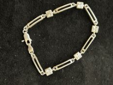 Silver bracelet set with 5 stones