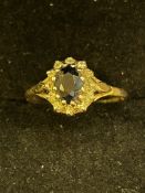 9ct Gold ring set with sapphires & diamonds Size O