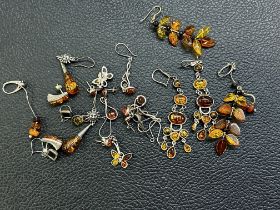 Collection of silver & amber earrings