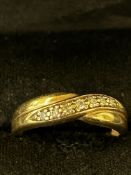 9ct Gold crossover ring set with diamonds Size M 2