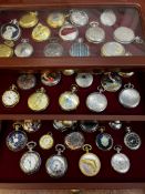 45 pocket watches in a display case