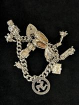 Silver charm bracelet - 10 charms