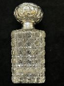 Silver top perfume bottle