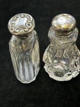 2 Silver top glass bottles