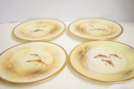 4 Royal Douton fish plates signed A Perry (Tiffany