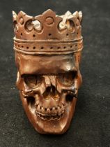 Wooden carved skull