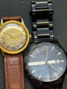 Armani exchange wristwatch together with timex aut