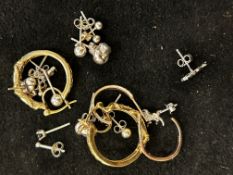 10 Pairs of silver earrings