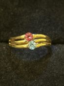 9ct Gold ring set with 2 gemstones ruby/aquamarine