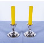 A pair of silver candlesticks 8cm tall marks for Birmingham