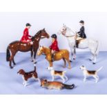 Beswick huntsman, huntswoman, boy on pony, hounds and associated fox