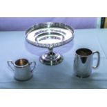 A silver plated comport, sugar bowl and a tankard