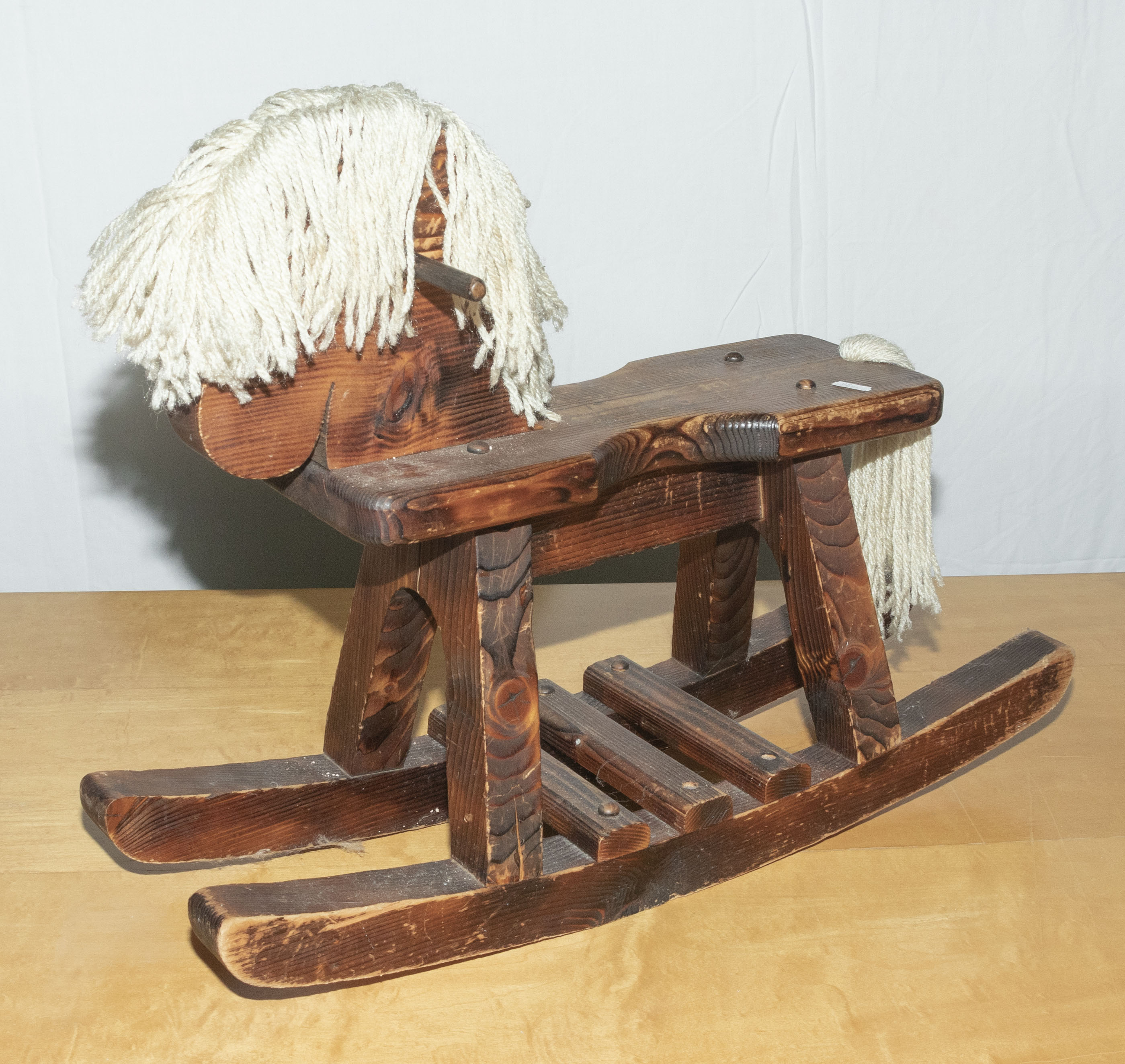 A child’s wooden rocking horse