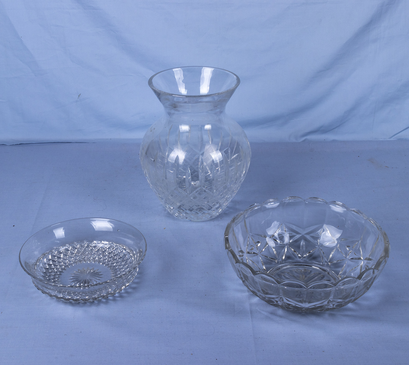A Stuart crystal vase and two bowls