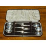 A cased set of six silver teaspoons marks for Birmingham