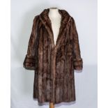 A lady's full length fur coat