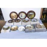 An assorted collection of decorative plates