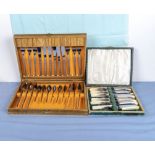 Two cased sets of cutlery