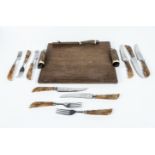 A vintage cheeseboard and utensils