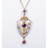 9ct gold pendant and chain set with garnets and seed pearls