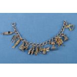 A 9ct gold charm bracelet 17cm long 32gms