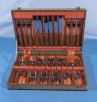 A canteen of wooden handle cutlery, six settings