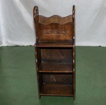 An oak book stand /magazine rack